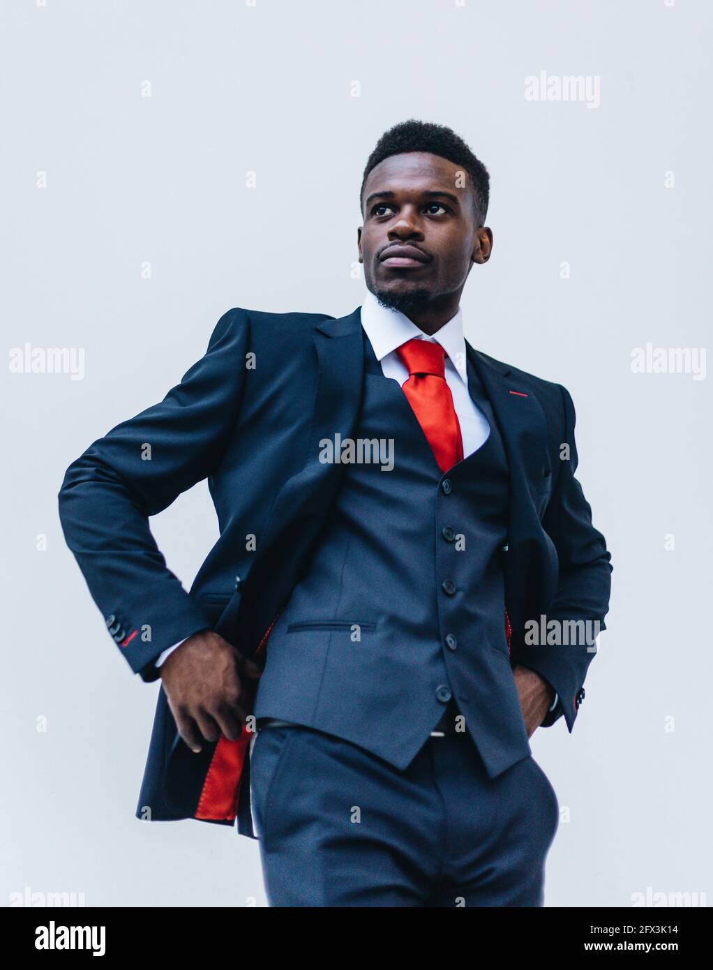 Business man in suit with white background Stock Photo - Alamy