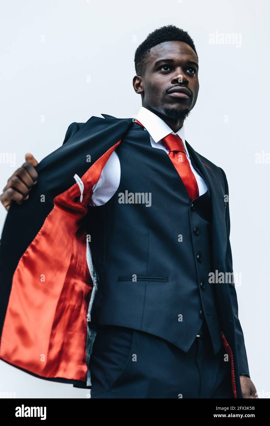 Business man in suit with white background Stock Photo - Alamy