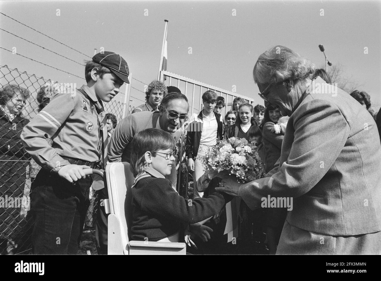 Princess Juliana opens clubhouse sea scout group Willem de Zwijger in Rotterdam; Princess Juliana receives flowers from Diane van Verre, April 14, 1984, FLOWERS, openings, scouting, princesses, scouting, The Netherlands, 20th century press agency photo, news to remember, documentary, historic photography 1945-1990, visual stories, human history of the Twentieth Century, capturing moments in time Stock Photo
