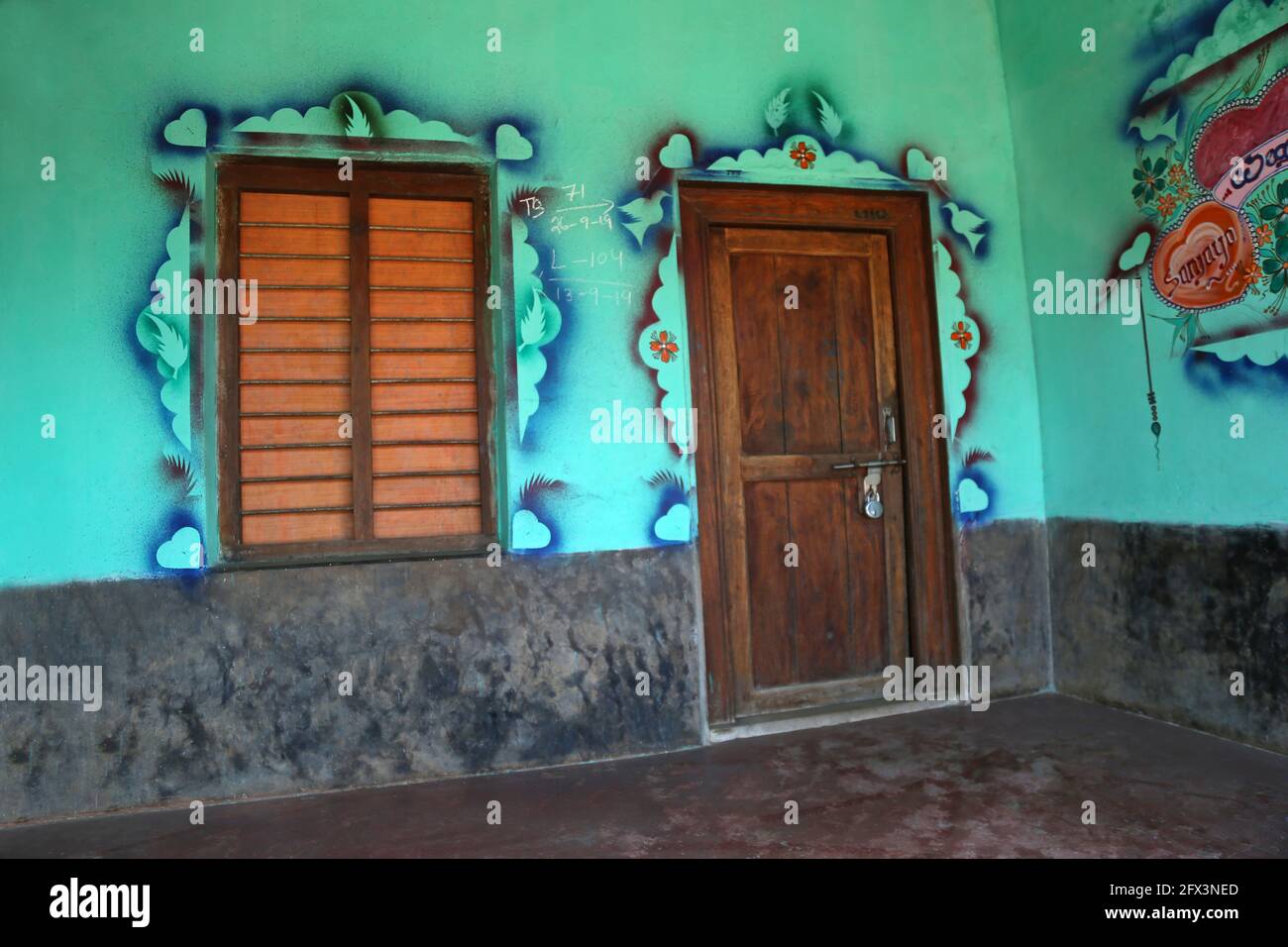 LANJIA SAORA TRIBE - Colorful exterior of a Lanjia Saora modern house. Gunpur village, Odisha, India. Stock Photo