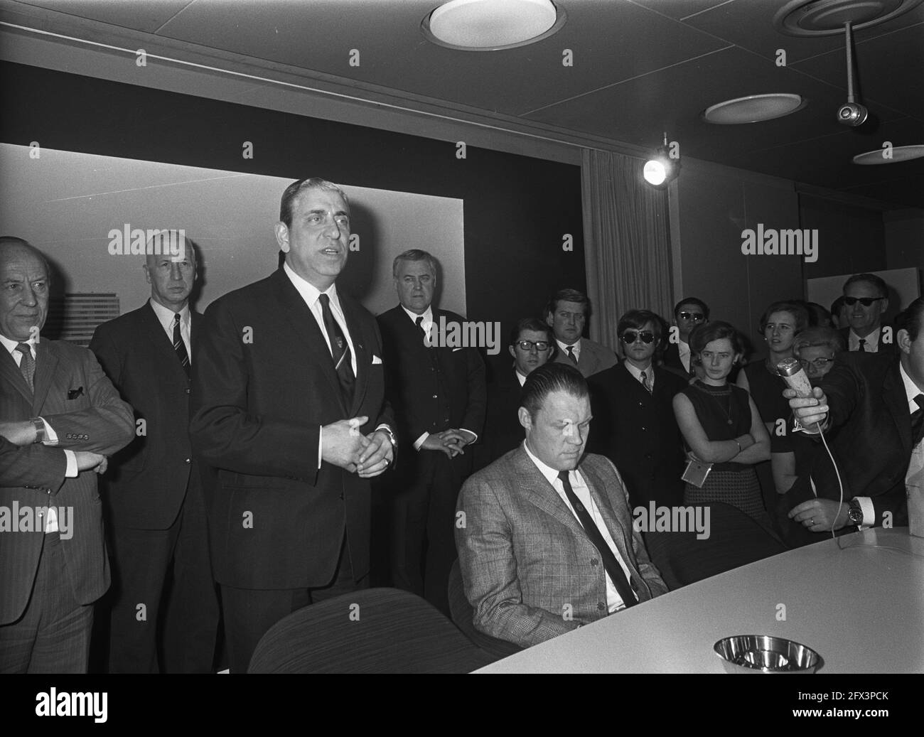 Ajax, team arrives at Schiphol airport from Paris. In the press room. Ajax chairman Jaap van Praag, with next to him (seated) trainer Rinus Michels, March 6, 1969, sports, soccer, The Netherlands, 20th century press agency photo, news to remember, documentary, historic photography 1945-1990, visual stories, human history of the Twentieth Century, capturing moments in time Stock Photo