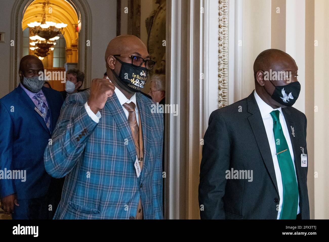 Philonise Floyd, the brother of George Floyd, left, and Attorney Benjamin Crump, right, are joined by members of George Floyd’s family as they arrive for a press conference with Speaker of the United States House of Representatives Nancy Pelosi (Democrat of California) at the US Capitol in Washington, DC, Tuesday, May 25, 2021. Credit: Rod Lamkey / CNP/Sipa USA Stock Photo