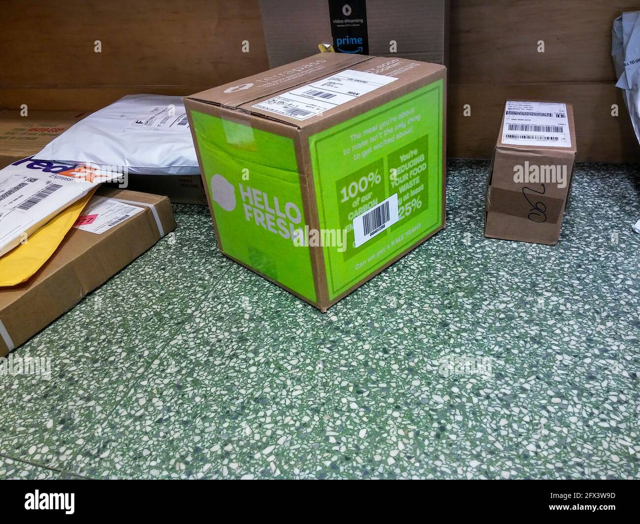 A delivery from the Hello Fresh meal subscription service waits to be picked up in the lobby of an apartment building in New York on Tuesday, May 11, 2021. (Photo by Richard B. Levine) Stock Photo