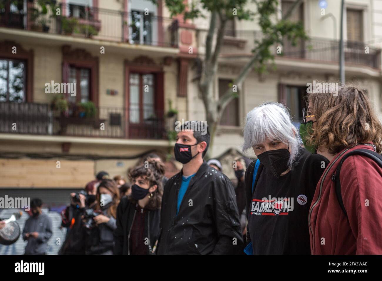 May 25, 2021, Barcelona, Catalonia, Spain: The Deputies of the Parliament of Catalonia, Dolors Sabater, EulÃ lia Reguant and Xavier Pellicer are seen in demonstration.A judicial eviction of three activists in Barcelona has ended up motivating an occupation, by protesters, at the headquarters of the political party ERC (Republican Left of Catalonia) on the first day of the mandate of the president of the Generalitat of Catalonia, Pere Aragones (ERC ).In the first line of the protest for the eviction, there were four deputies of the political party CUP (Popular Unity Candidacy), among them Dol Stock Photo