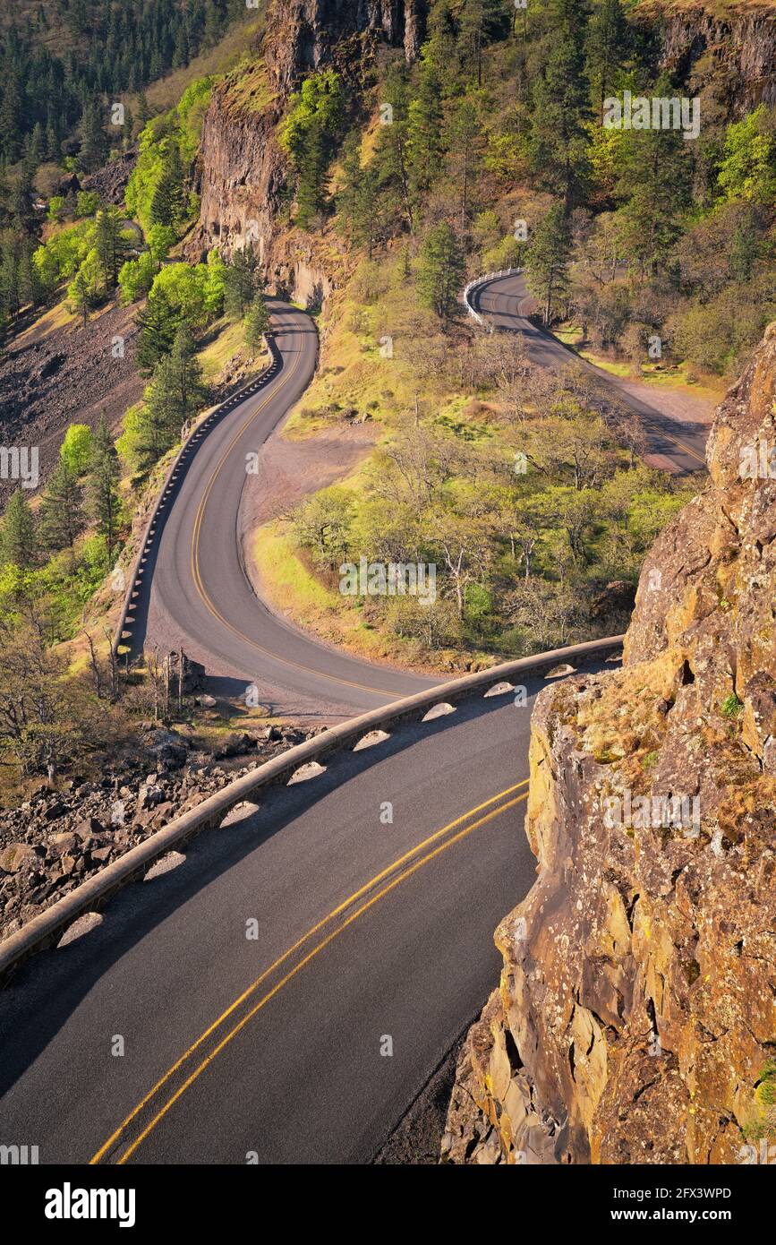 The Rowena Loops hug the rock cliffs just below Rowena Crest Viewpoint on Oregon’s Historic Columbia River Highway in Wasco County. Stock Photo