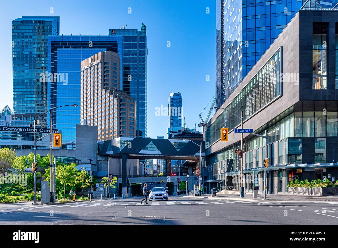 The downtown district of Toronto, Canada. The image shows the pedestrian bridge of the Skywalk. The bridge crosses over Simcoe Street. East to West po Stock Photo