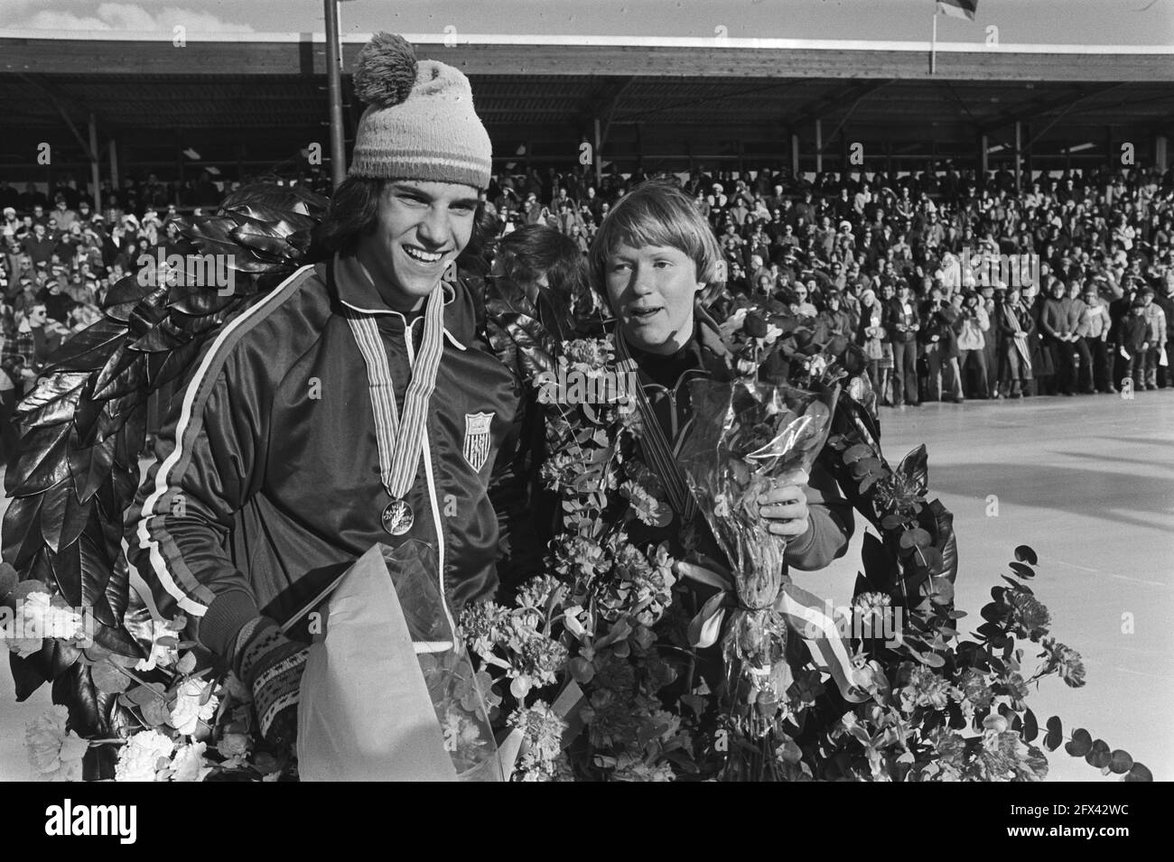 The champions Eric Heiden and Sylvia Burka with laurel wreath, February 27, 1977, speed skaters, sports, world championships, The Netherlands, 20th century press agency photo, news to remember, documentary, historic photography 1945-1990, visual stories, human history of the Twentieth Century, capturing moments in time Stock Photo