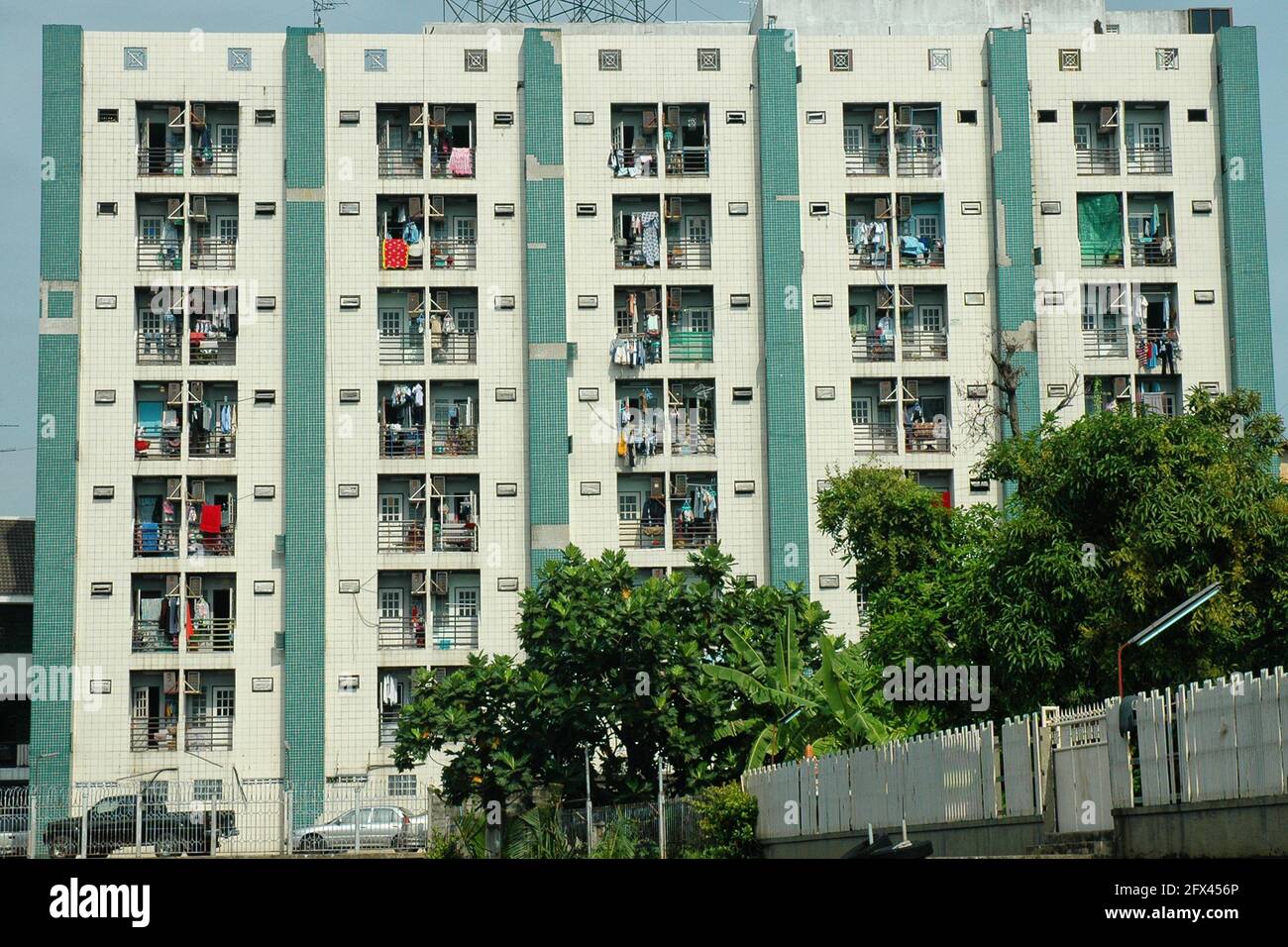 Apartment building with symmetrical design in Bangkok Stock Photo - Alamy