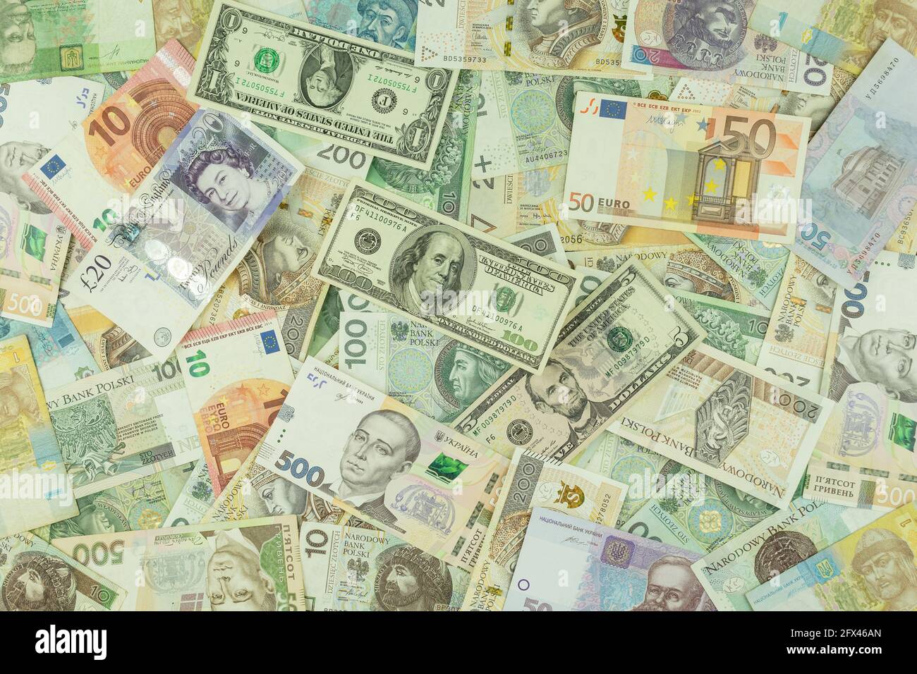 Paper bills of money of different denominations from different