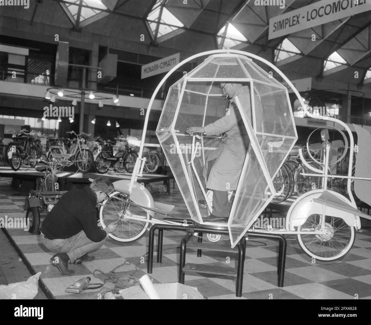 The two-wheeler and caravan exhibition in RAI, the Jetsons cosmos cycle or moon bike with rotating cabin, elevator, propeller, and so on, February 23, 1966, propellers, The Netherlands, 20th century press agency photo, news to remember, documentary, historic photography 1945-1990, visual stories, human history of the Twentieth Century, capturing moments in time Stock Photo