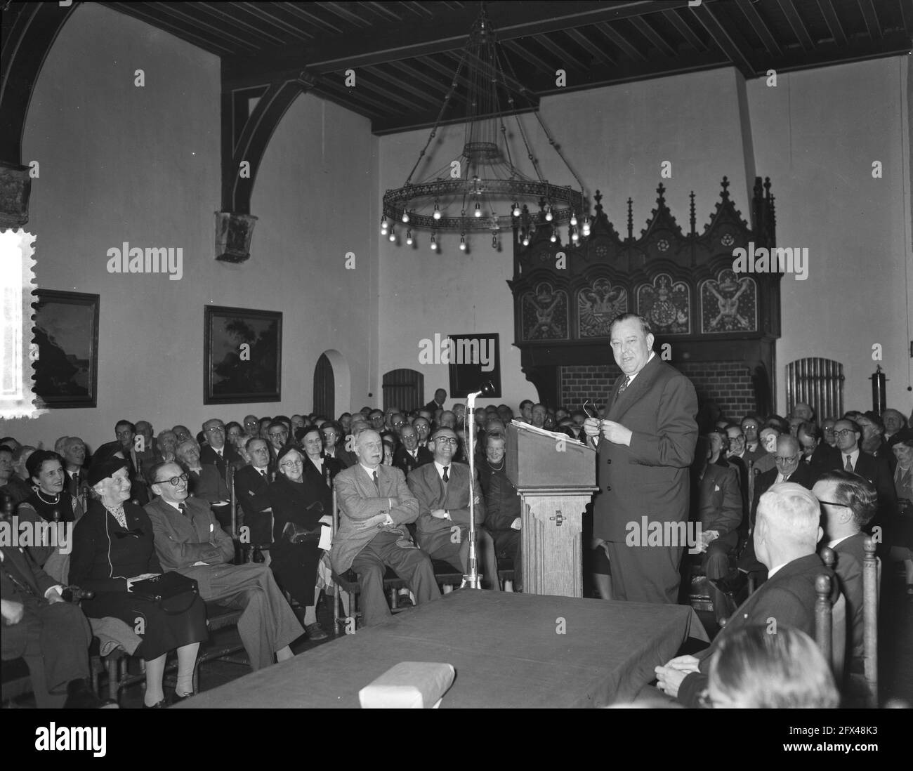 The former Secretary-General of the United Nations, Trygve Lie, delivers a speech in the roll call room at the Binnenhof in The Hague before the Association for International Legal Order and the Society for International Tasks, November 18, 1954, international affairs, speeches, The Netherlands, 20th century press agency photo, news to remember, documentary, historic photography 1945-1990, visual stories, human history of the Twentieth Century, capturing moments in time Stock Photo
