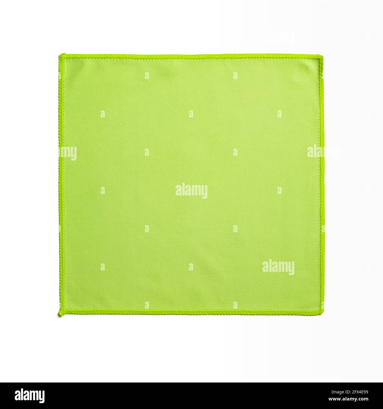 Square green microfiber cloth isolated on white background. Soft nonwoven microfiber material