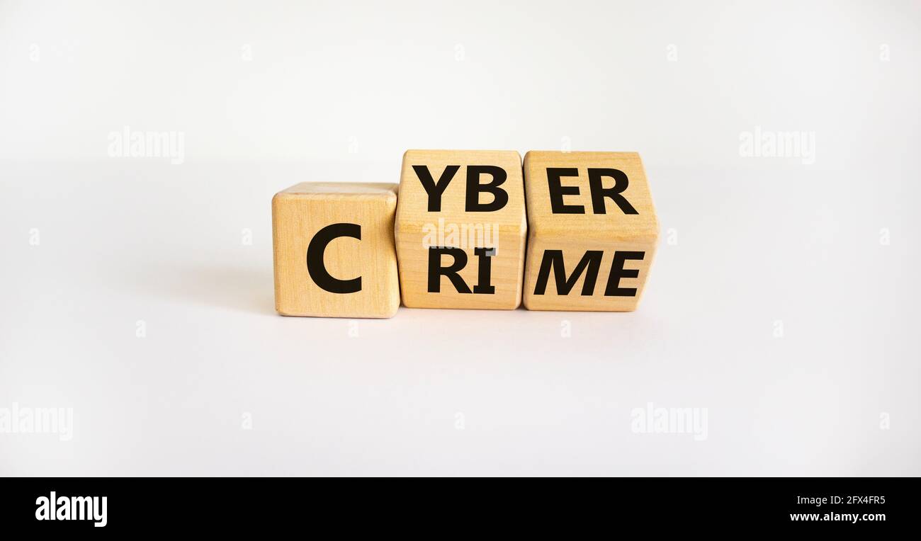 Cyber crime symbol. Turned wooden cubes with words 'Cyber crime'. Beautiful white background. Cyber crime and business concept. Copy space. Stock Photo