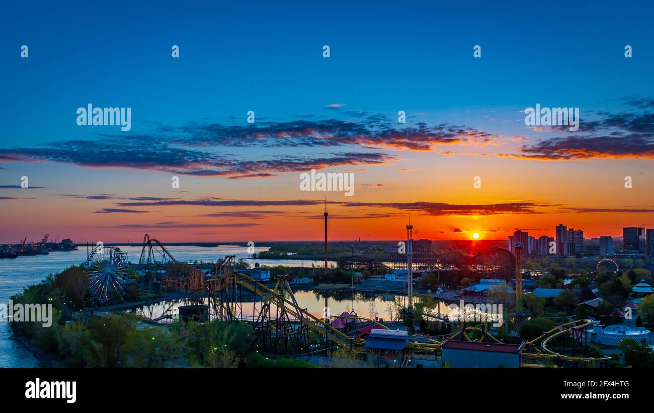 Beautiful sunrise view over La Ronde amusement park located on the northern tip of Saint Helen's island, in Montreal, Canada Stock Photo