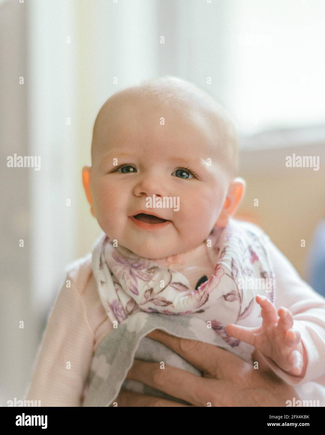 Pretty smiling baby girl Stock Photo