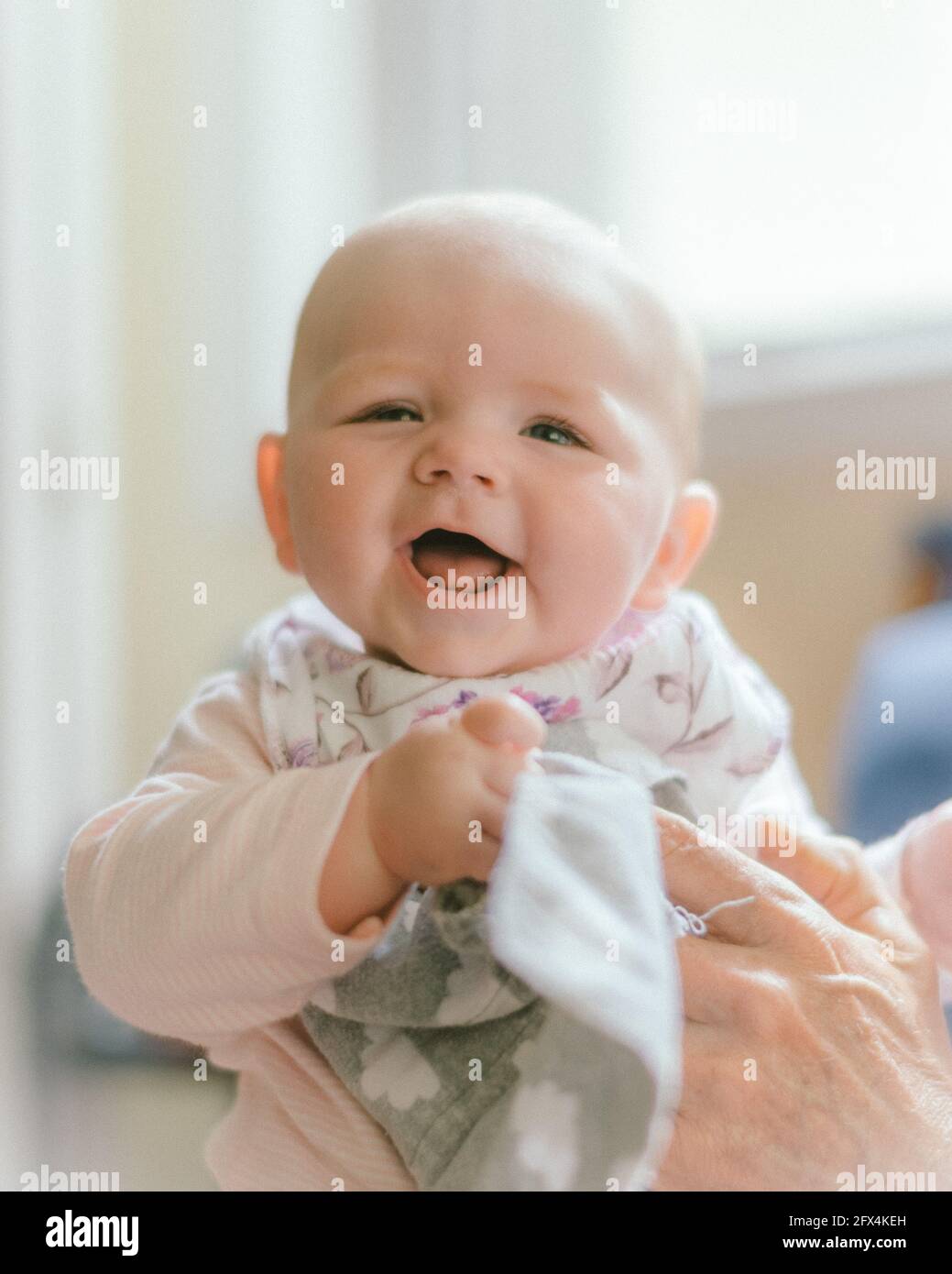 Pretty smiling happy baby girl Stock Photo