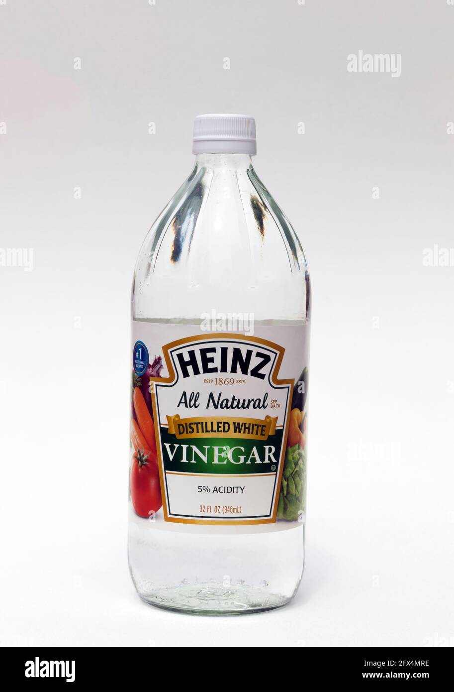 Distilled white vinegar in a bottle. Stock Photo
