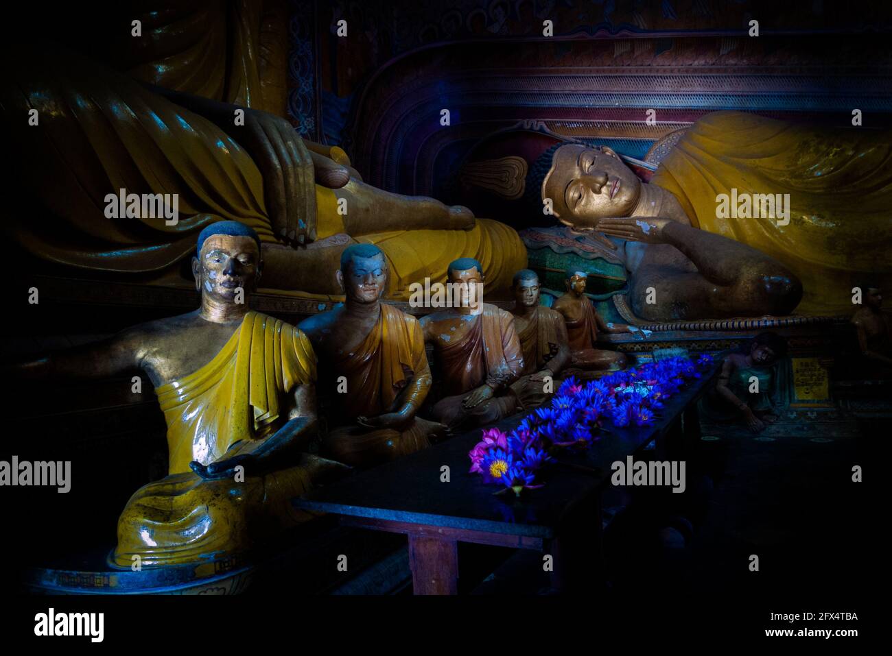 Dikwella, Wewurukannala Vihara Temple, Sri Lanka: interior room with small seated Buddhas Stock Photo