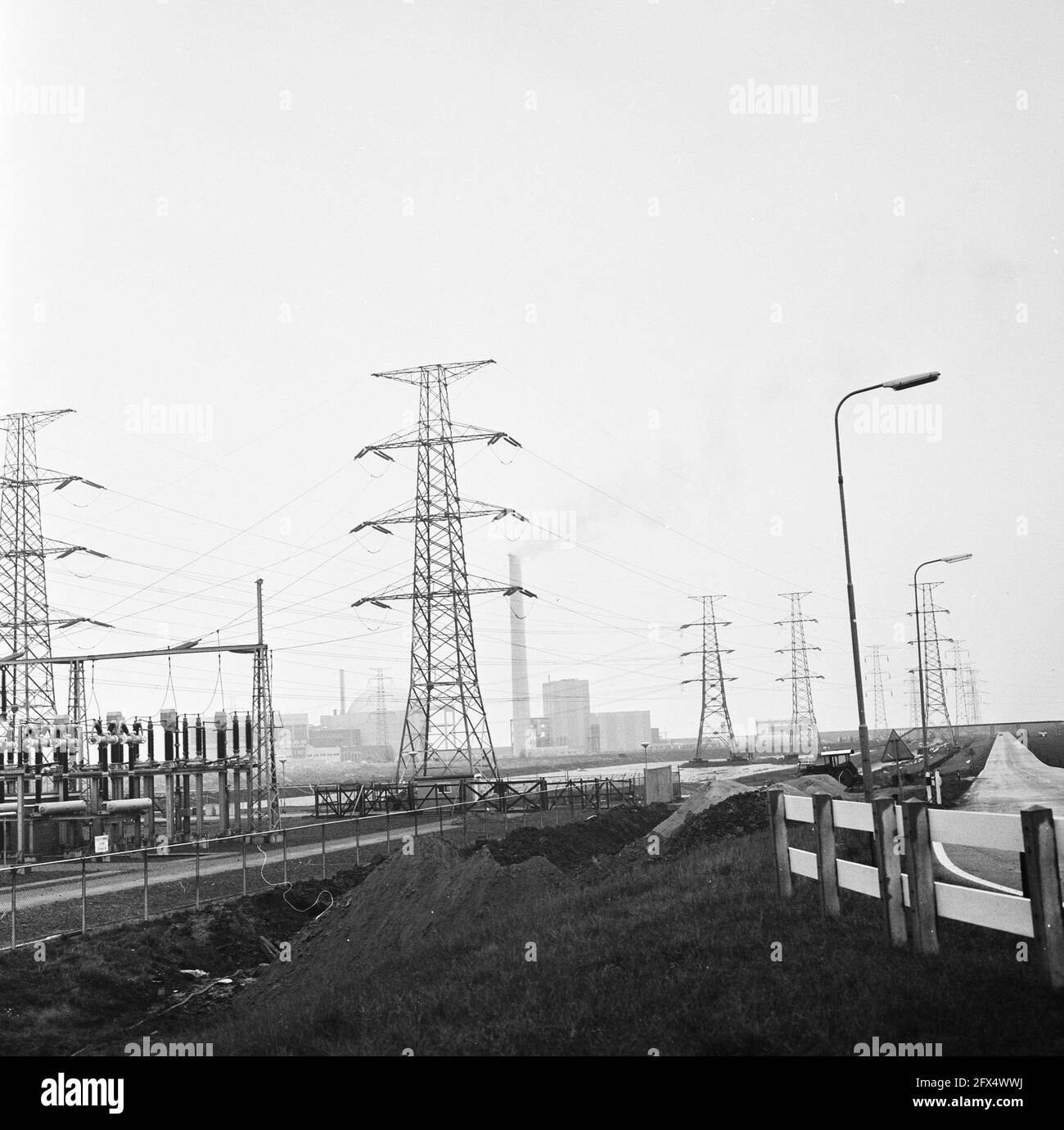 Exterior of the power plant with highvoltage pylons, November 10, 1973