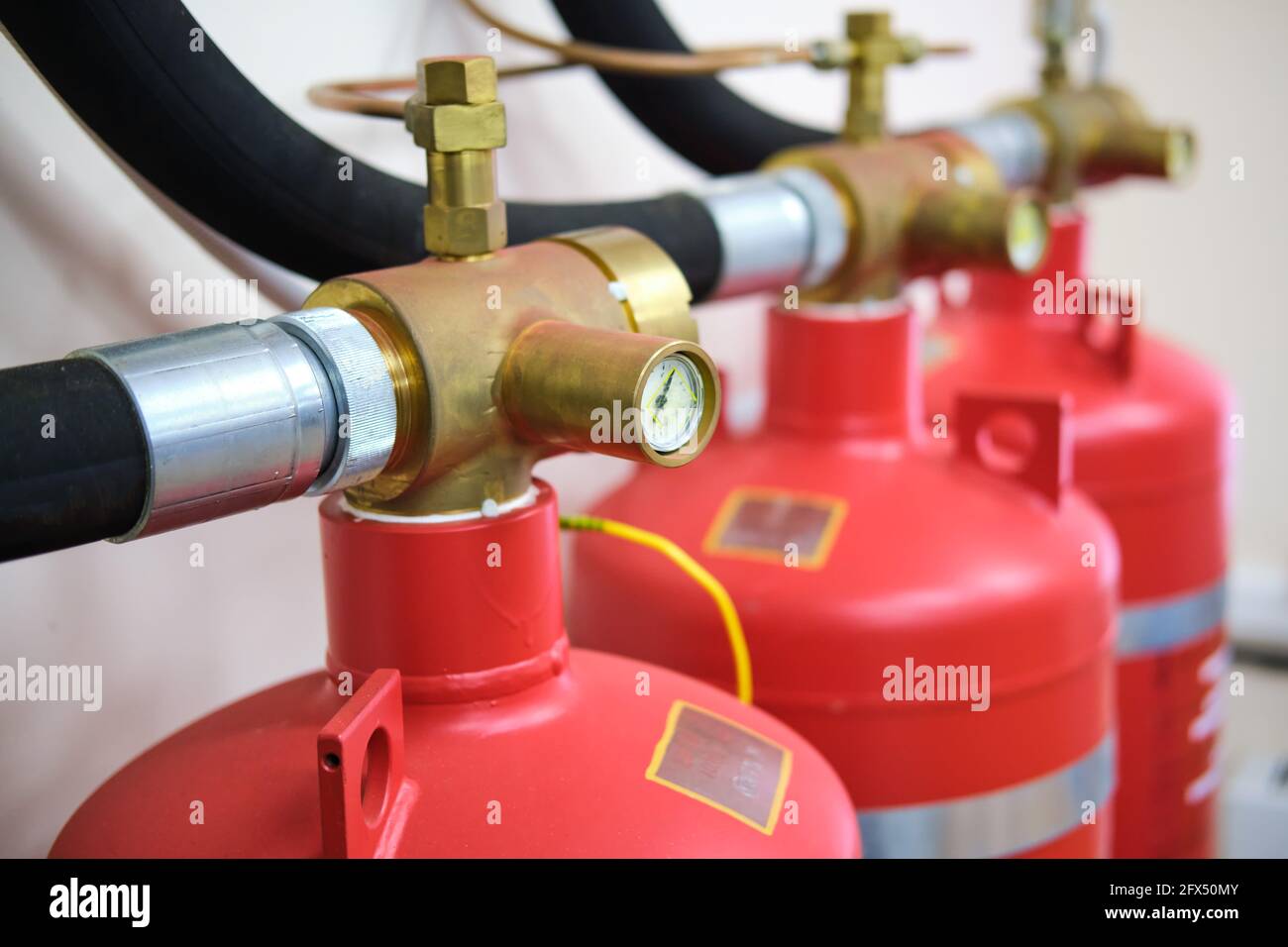 Red fire safety cylinders for gas fire extinguishing Stock Photo Alamy