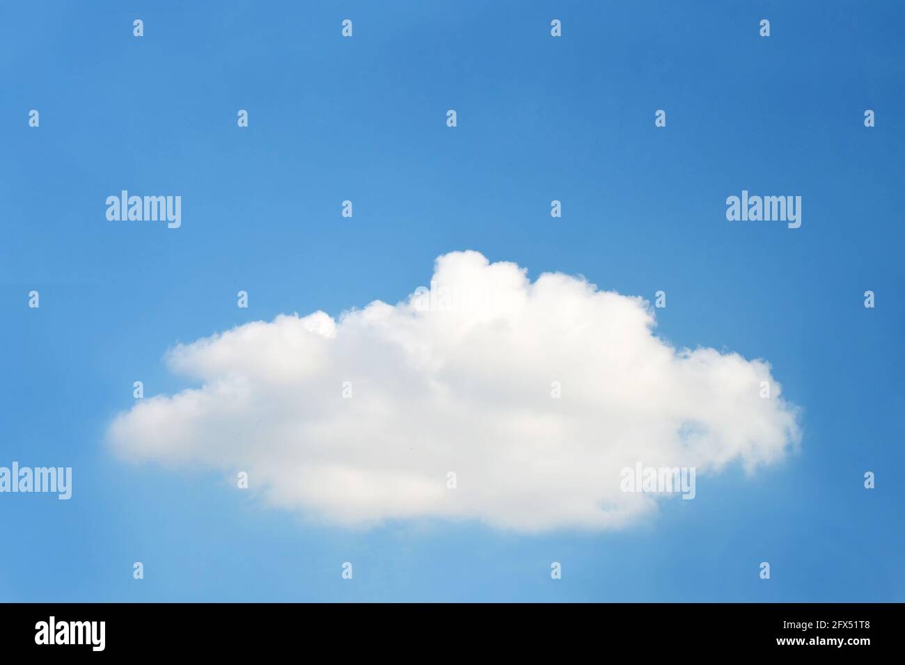 Single fluffy cloud on blue sky Stock Photo