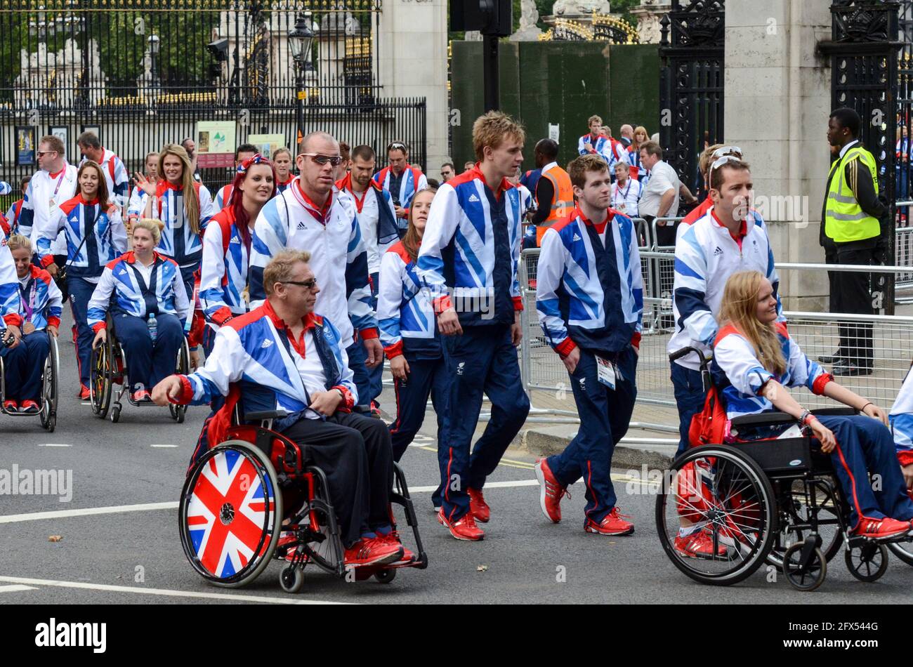 Paralympians of Team GB Olympians leaving Buckingham Palace after the parade. London 2012 Olympics competitors, some in wheelchairs Stock Photo