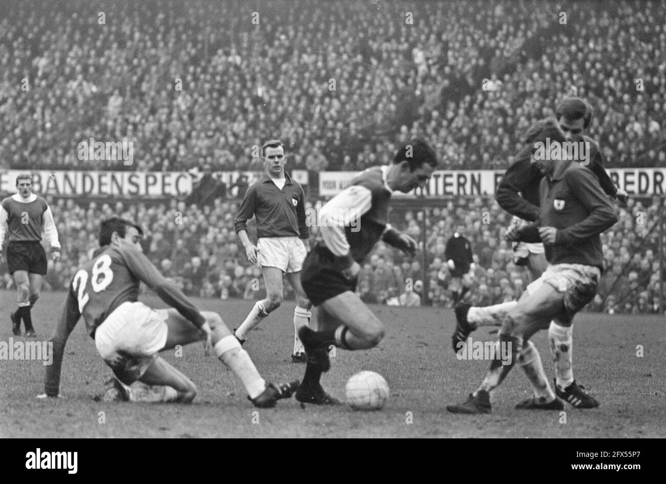 Feyenoord v NEC 2-0. Samardzic with four opponents around him; Ad Mellaart (28), Chris Geutjes, Kees Kornelis, 7 January 1968, sports, soccer, The Netherlands, 20th century press agency photo, news to remember, documentary, historic photography 1945-1990, visual stories, human history of the Twentieth Century, capturing moments in time Stock Photo