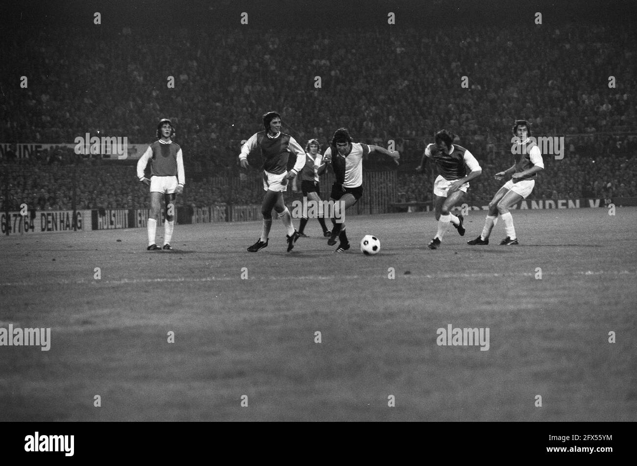 Feyenoord vs PSV 1-1, Van Hanegem in action, left Dijkers and right Pleun Strik, 15 September 1973, sports, soccer, The Netherlands, 20th century press agency photo, news to remember, documentary, historic photography 1945-1990, visual stories, human history of the Twentieth Century, capturing moments in time Stock Photo