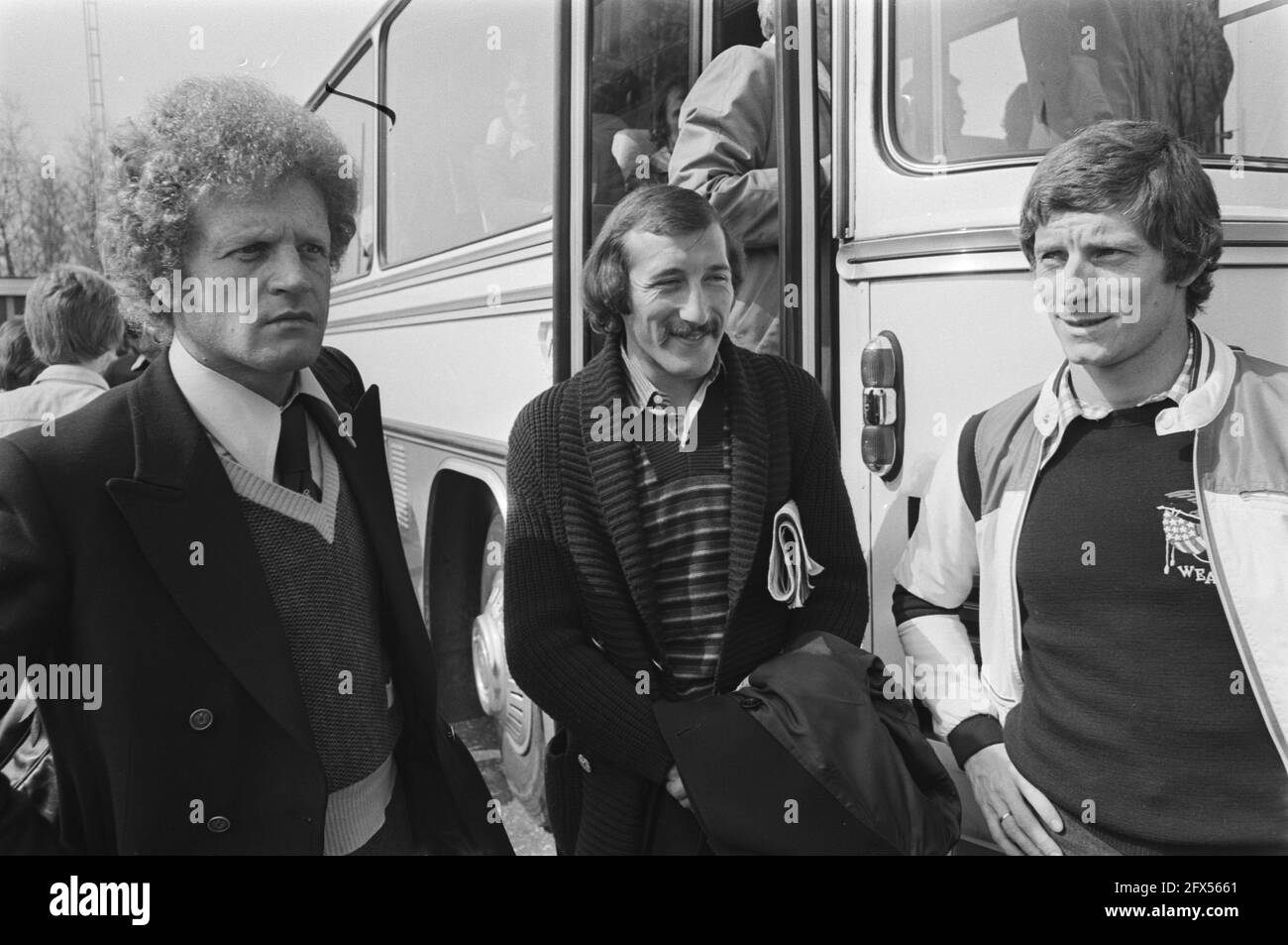 Arrival players St. Etienne at Eindhoven airport from left to right trainer Robert Herbin, Patrick Revelli and goal scorer Jean.Michel Larqué, April 13, 1976, sports, soccer, soccer players, The Netherlands, 20th century press agency photo, news to remember, documentary, historic photography 1945-1990, visual stories, human history of the Twentieth Century, capturing moments in time Stock Photo