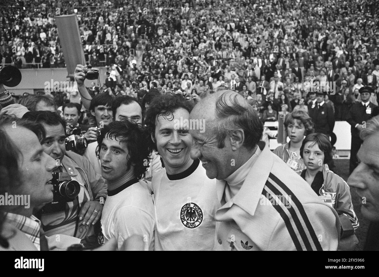 Finals World Cup 1974 in Munich, West Germany against the Netherlands 2-1; l.t.r. Muller, Beckenbauer and trainer Schon afterwards, July 7, 1974, finals, sports, soccer, world championships, The Netherlands, 20th century press agency photo, news to remember, documentary, historic photography 1945-1990, visual stories, human history of the Twentieth Century, capturing moments in time Stock Photo