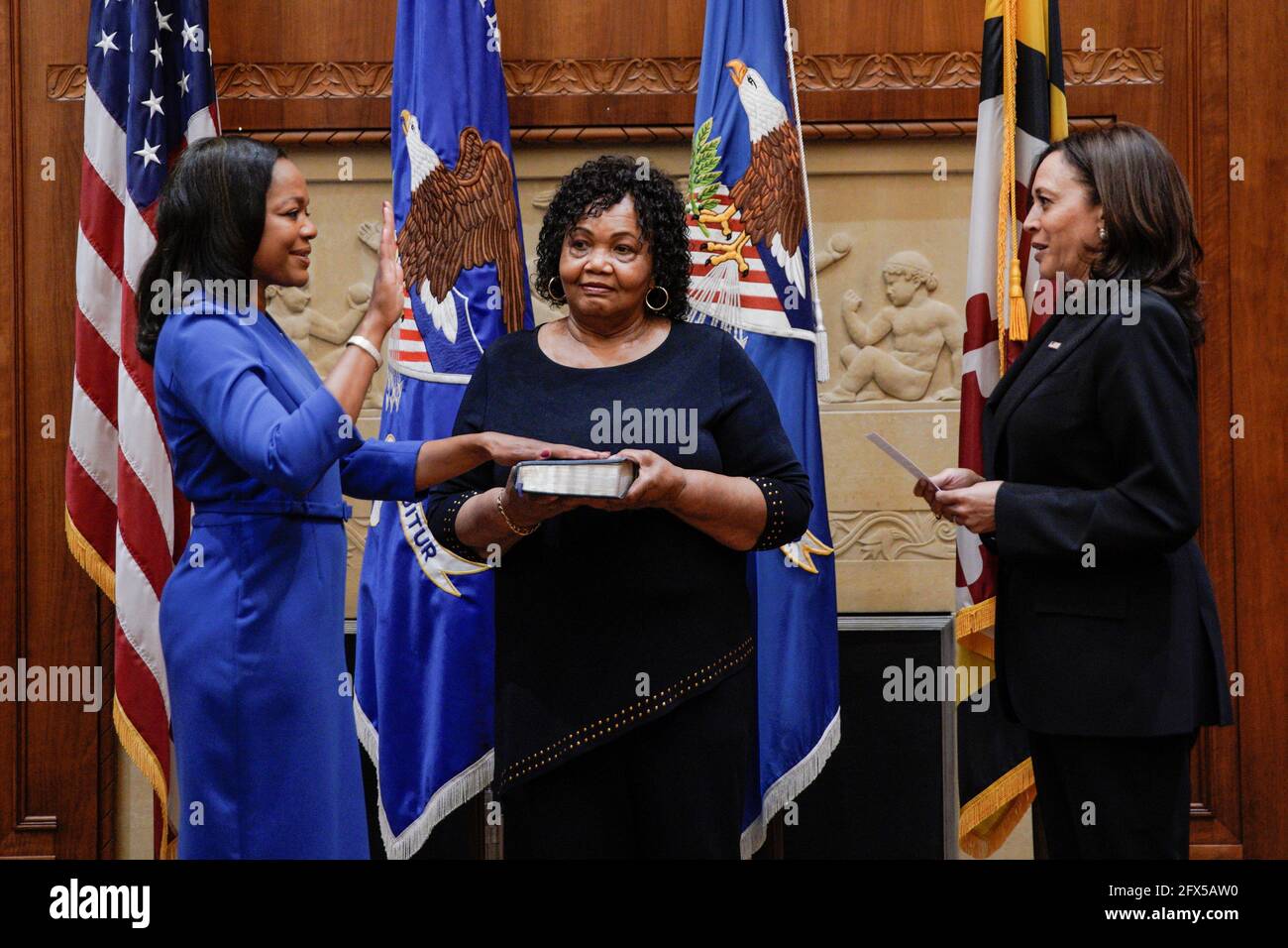 U.S. Vice President Kamala Harris ceremonially swears in Kristen Clarke as Assistant Attorney General for the Civil Rights Division, alongside Kristen's mother Pansy Clarke (C), at the Department of Justice in Washington, U.S., May 25, 2021. REUTERS/Yuri Gripas Stock Photo