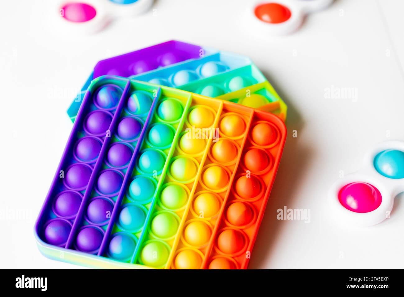 Pop It Simple Dimple - sensory anti-stress Fidget toys isolated white  background Stock Photo - Alamy