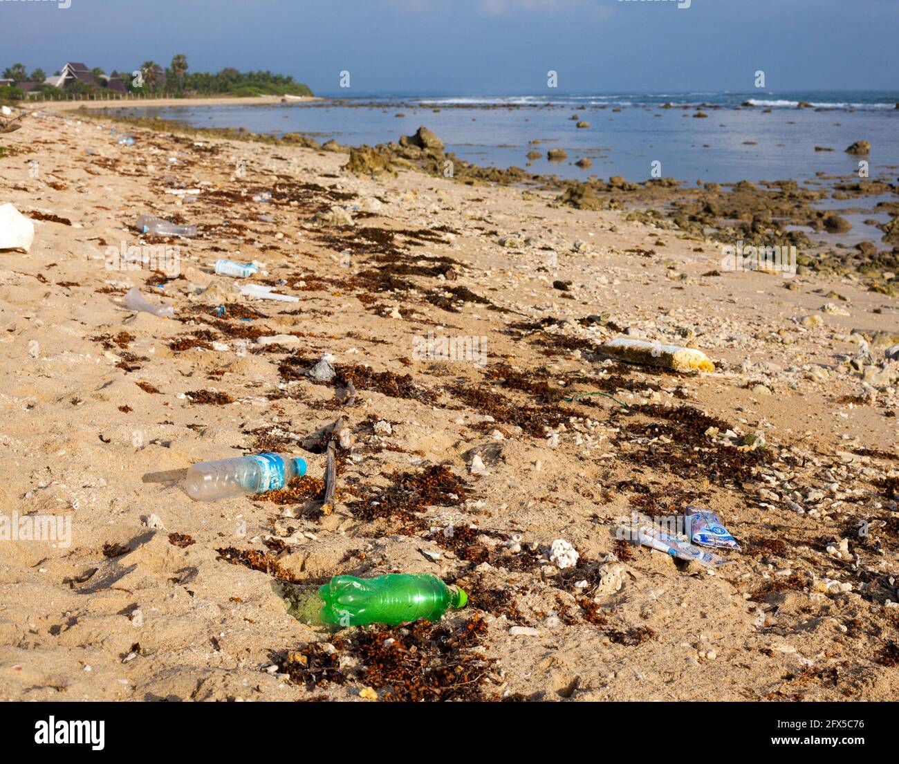 Plastic bottles strewn across Pasikuda Beach, Kalkudah, Northern