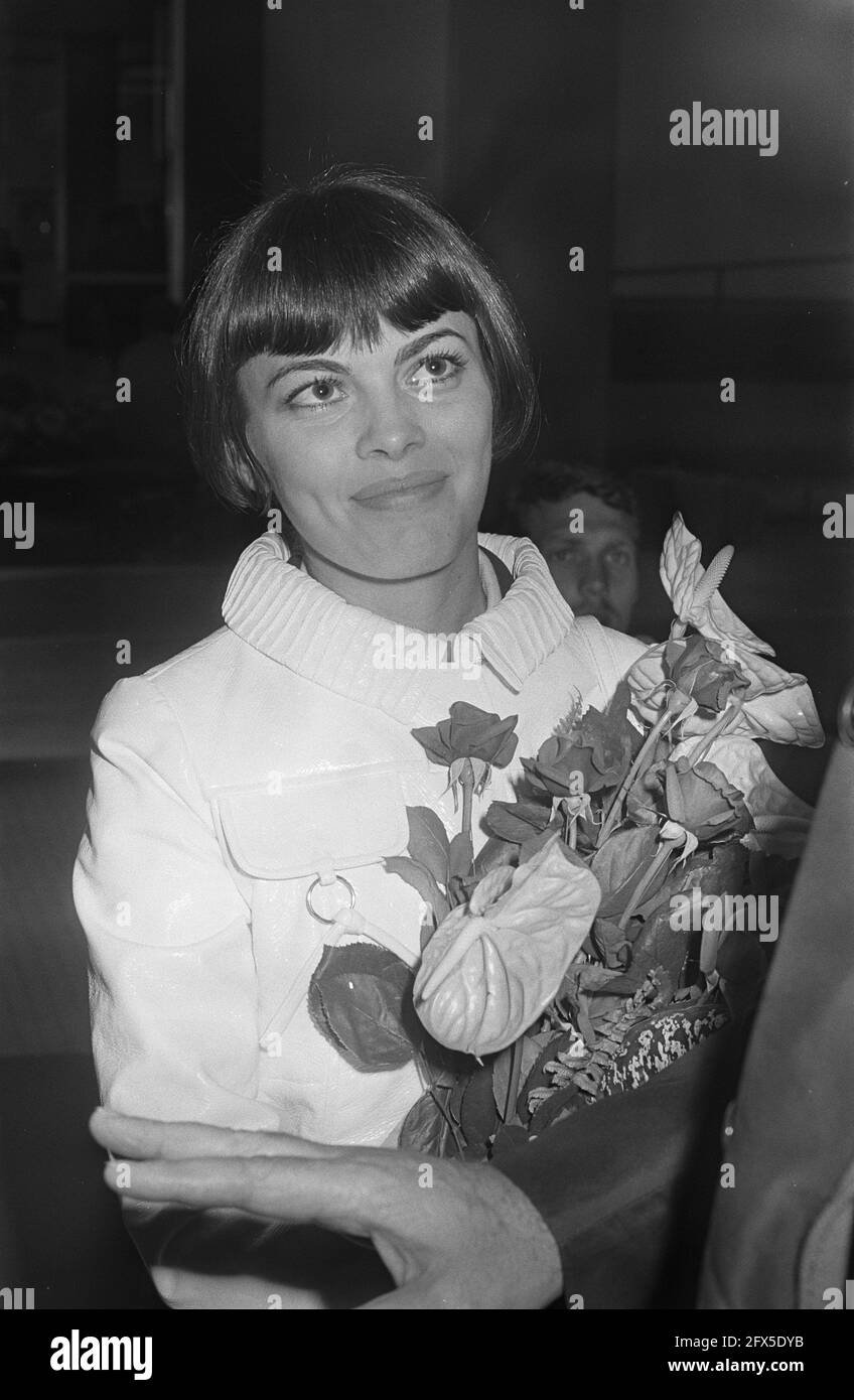 French singer Mireille Mathieu is welcomed with flowers at Schiphol Airport, June 30, 1970, arrival and departure, chansonnière, chansons, portraits, singers, The Netherlands, 20th century press agency photo, news to remember, documentary, historic photography 1945-1990, visual stories, human history of the Twentieth Century, capturing moments in time Stock Photo