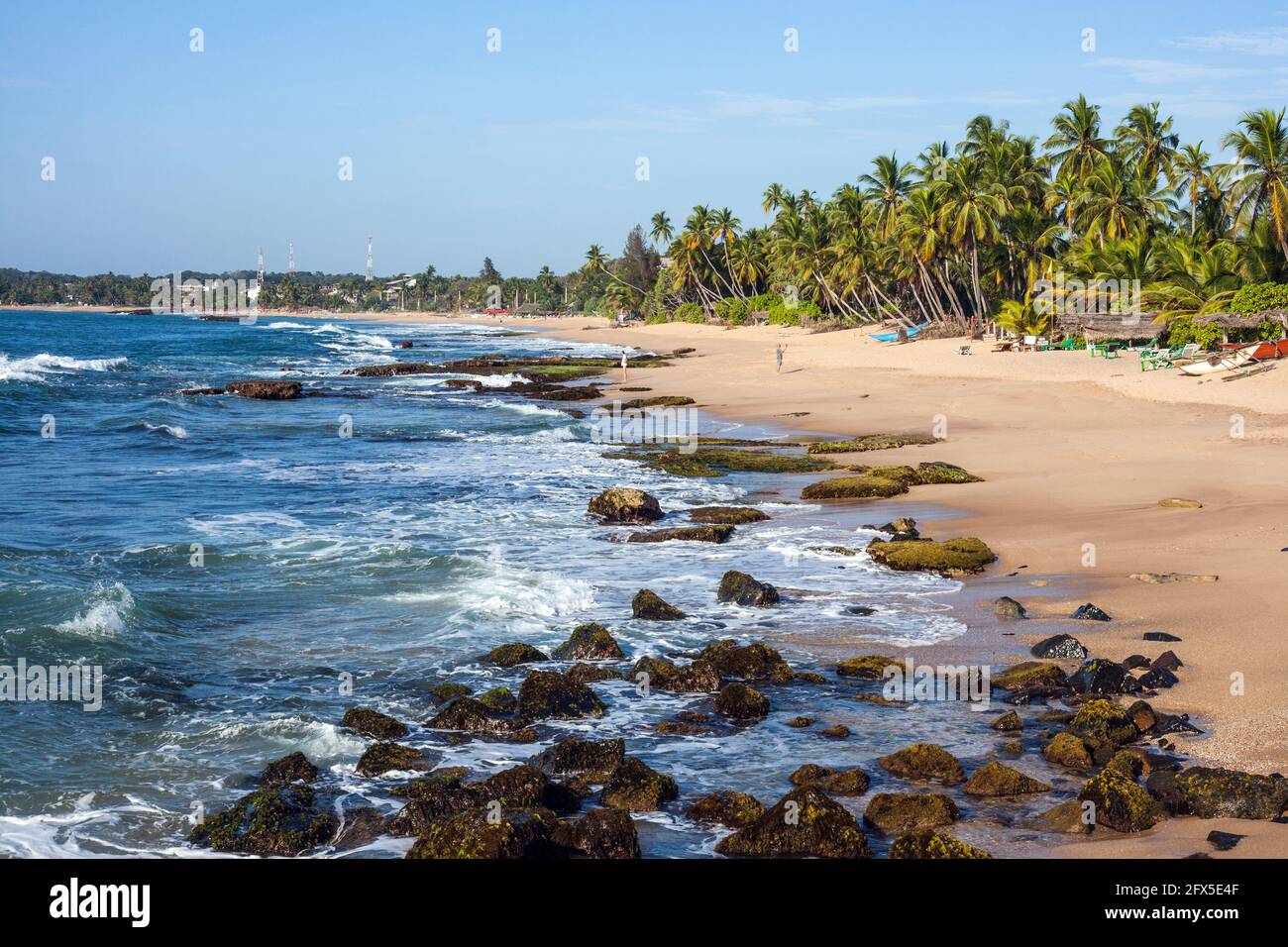 Desolate, sweeping curve of Tangalle beach, Southern Province, Sri Lanka Stock Photo