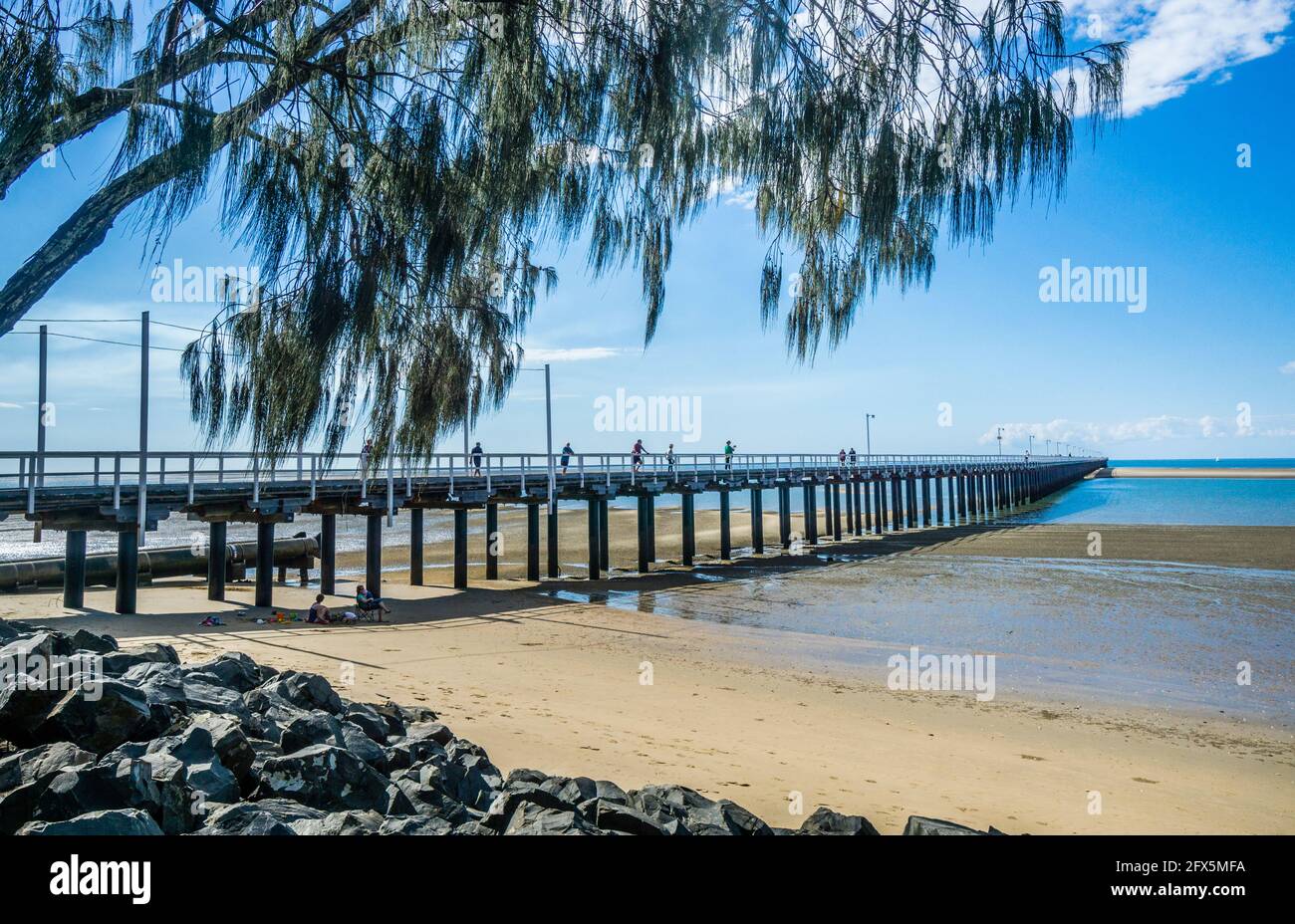 view of historic Urangan Pier, once used for cargo transfer, now popular for fishing and scenic views, Hervey Bay, Fraser Coast Region, Queensland, Au Stock Photo
