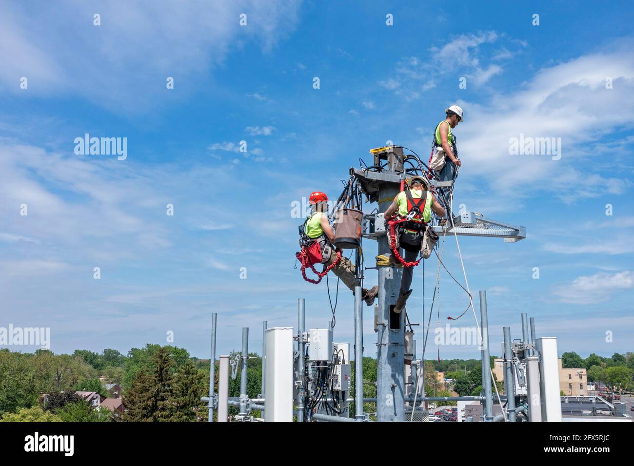 Detroit, Michigan - Workers upgrade an AT&T cell tower to the faster 5G ...