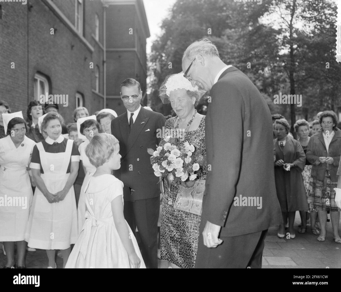 H. M. the Queen visits the Ant. van Leeuwenhoek House Flowers are offered to the Queen, June 20, 1961, FLOWERS, offers, queens, The Netherlands, 20th century press agency photo, news to remember, documentary, historic photography 1945-1990, visual stories, human history of the Twentieth Century, capturing moments in time Stock Photo