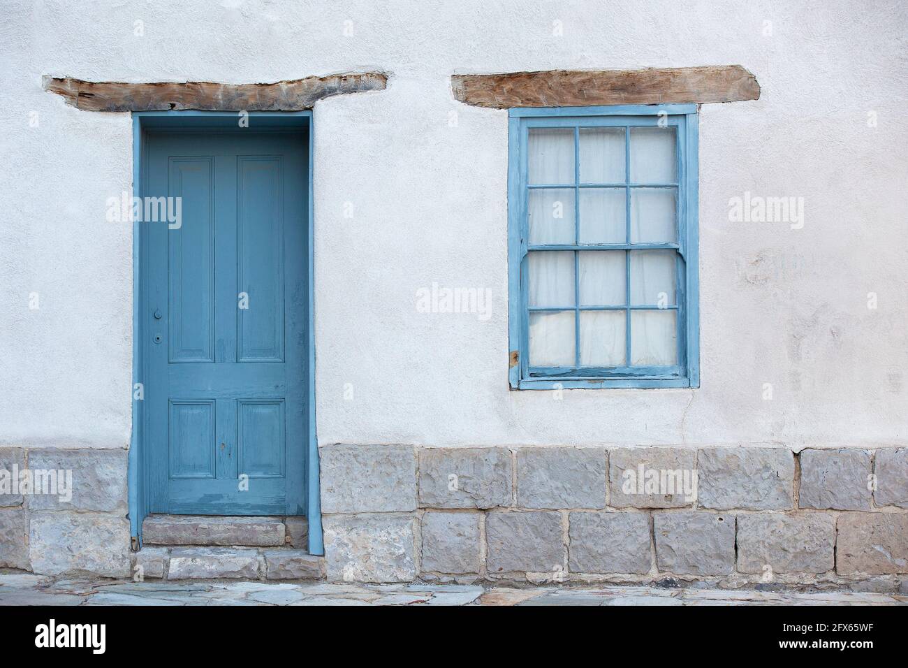 Blue door and window frame in Barrio Viejo, Tucson's historic old neighborhood Stock Photo