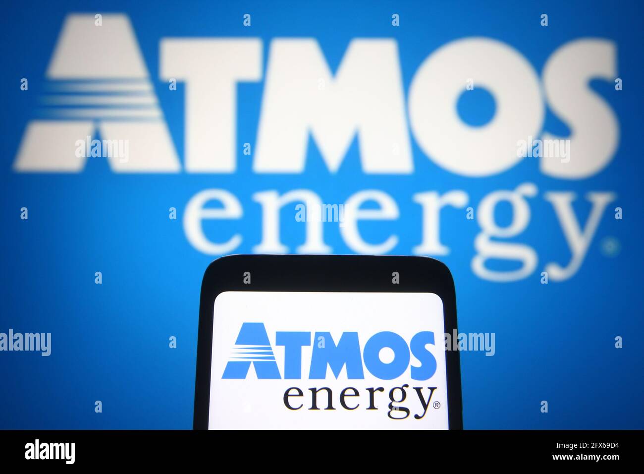 In this photo illustration, Atmos Energy logo of an US natural gas