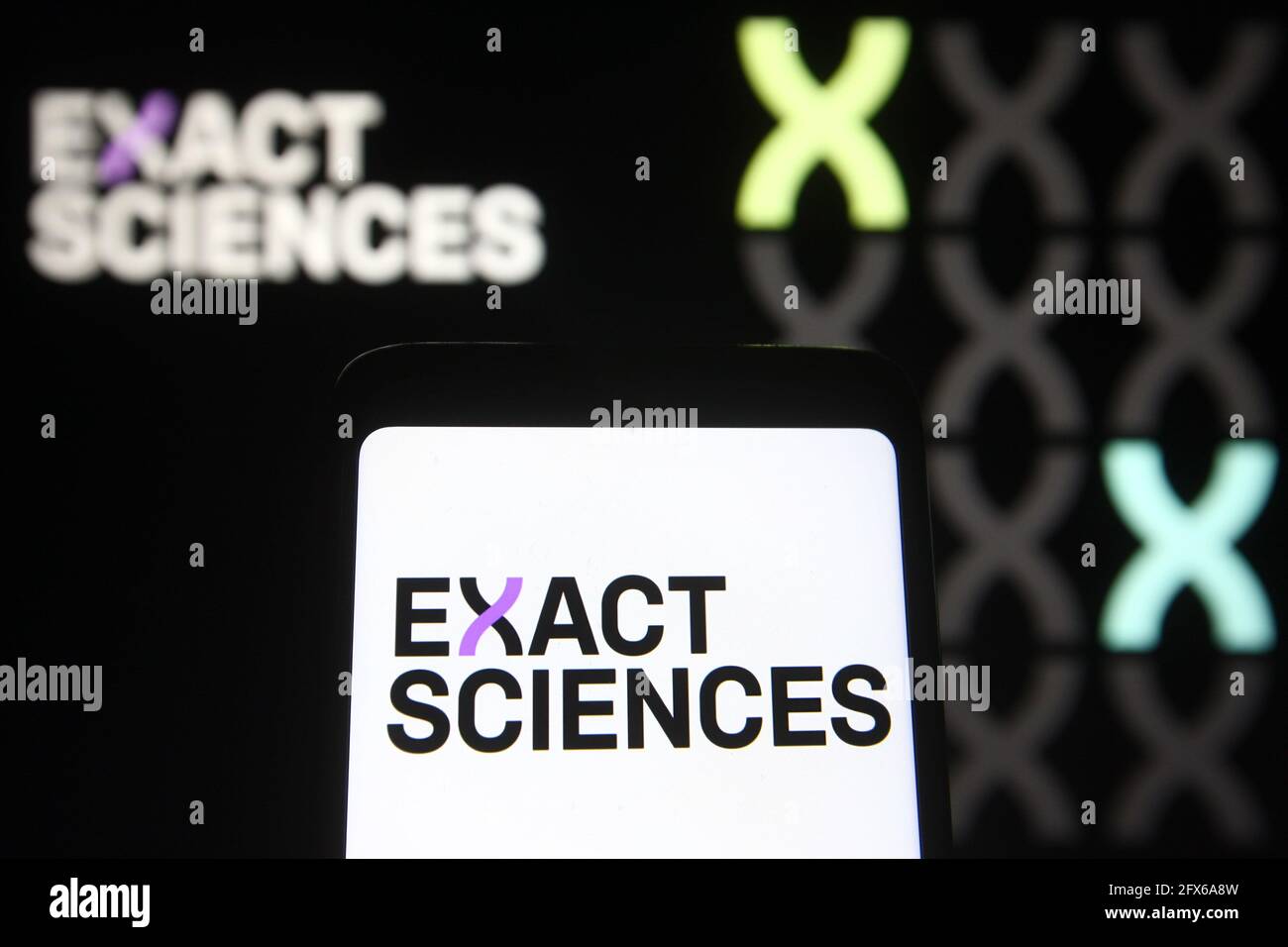 In this photo illustration, Exact Sciences logo of a molecular