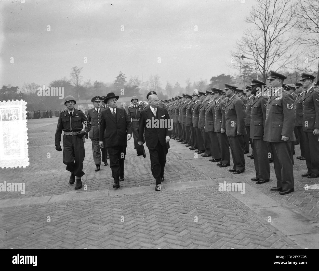 The U.S. 32 Tactical Fighter Squadron (stationed at Soesterberg, and consisting of Sabre aircraft) is placed under the operational command of the Royal Air Force. Minister of War C. Staf and U.S. Ambassador H. Freeman Matthews inspect the honor guard, November 16, 1954, diplomats, air force, military, ministers, transfers, The Netherlands, 20th century press agency photo, news to remember, documentary, historic photography 1945-1990, visual stories, human history of the Twentieth Century, capturing moments in time Stock Photo