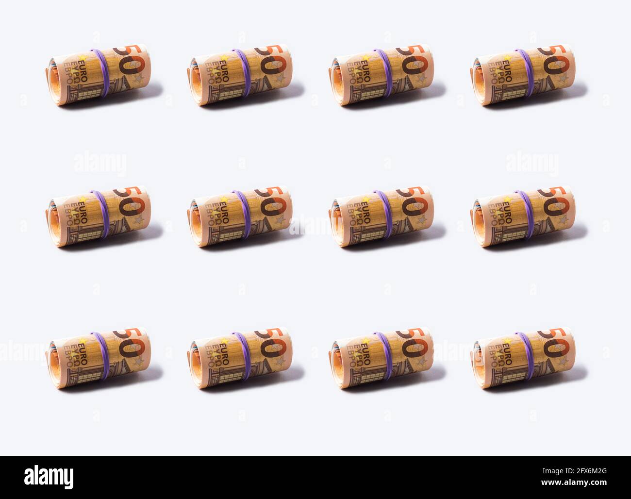 Euro 50 value banknotes roll pattern on gray background Stock Photo - Alamy