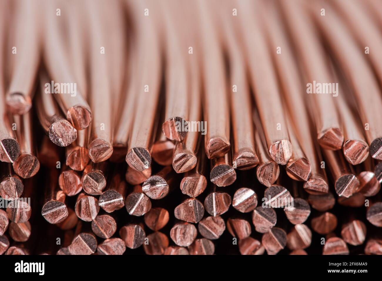 Close-up Copper Wire Scrap Material with Blurred Background Stock Photo