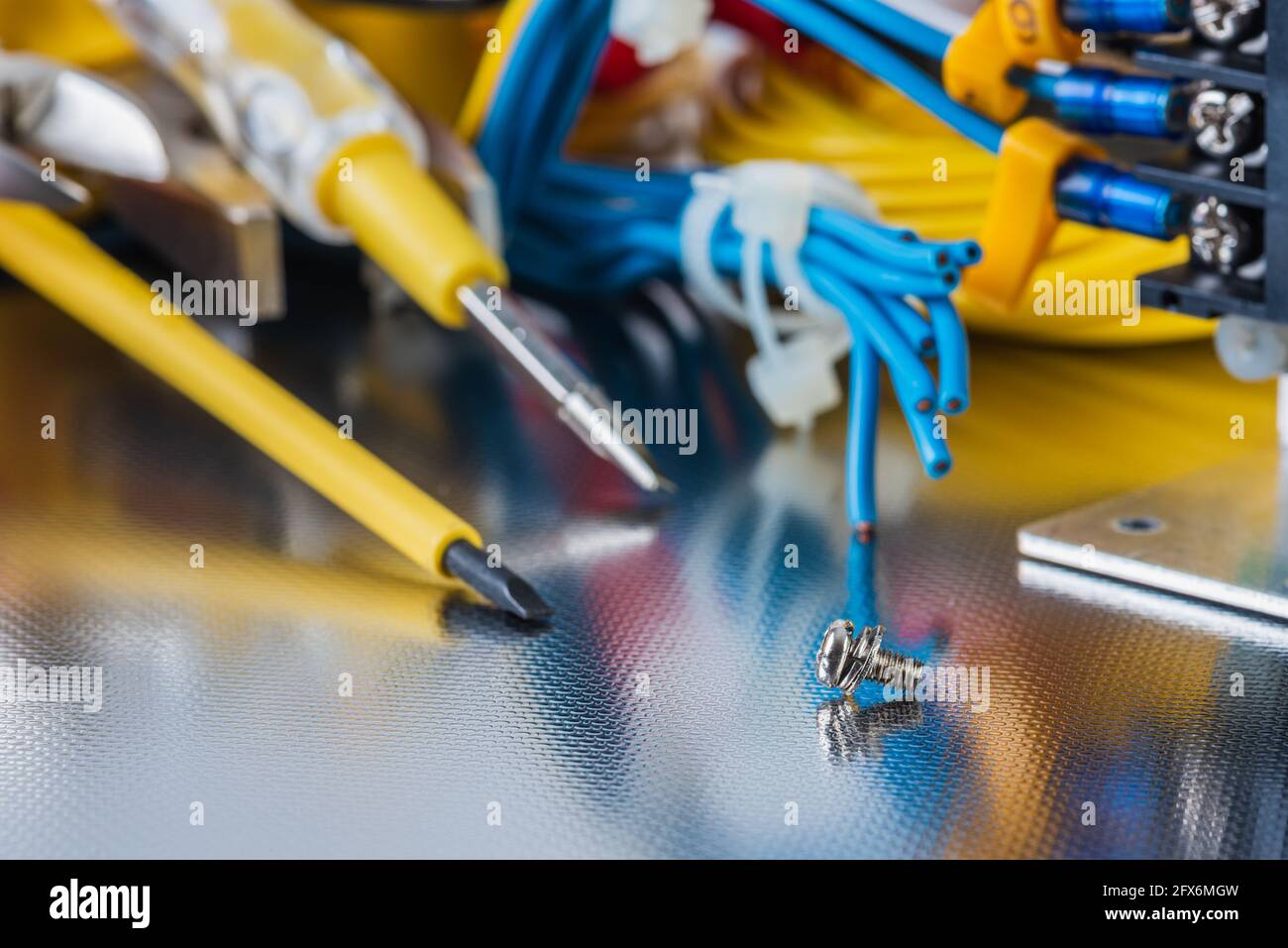 Set of electrical tools and equipment on a metal background, closeup Stock Photo