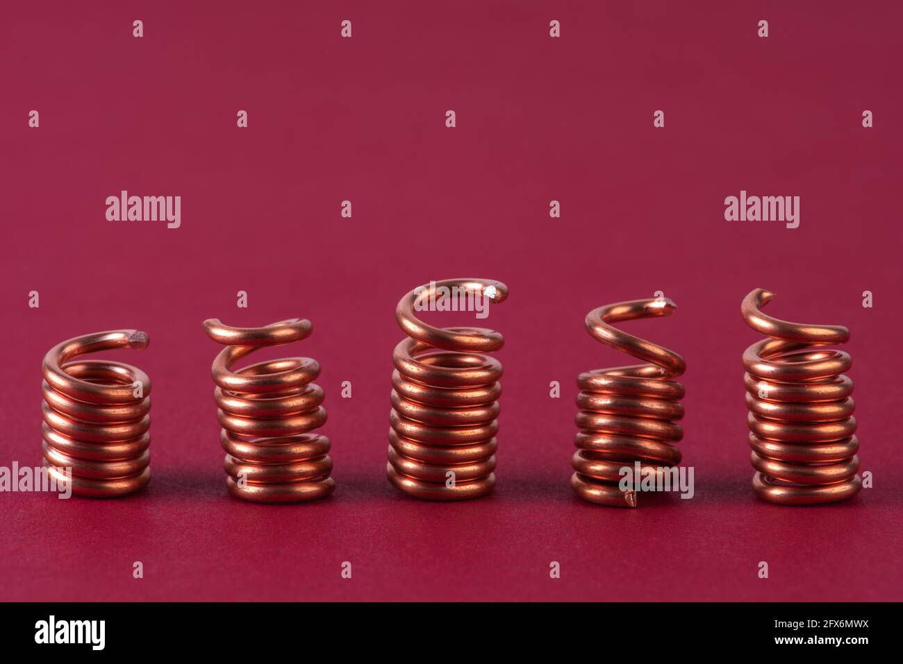 Row of copper wire spring scrap Stock Photo Alamy