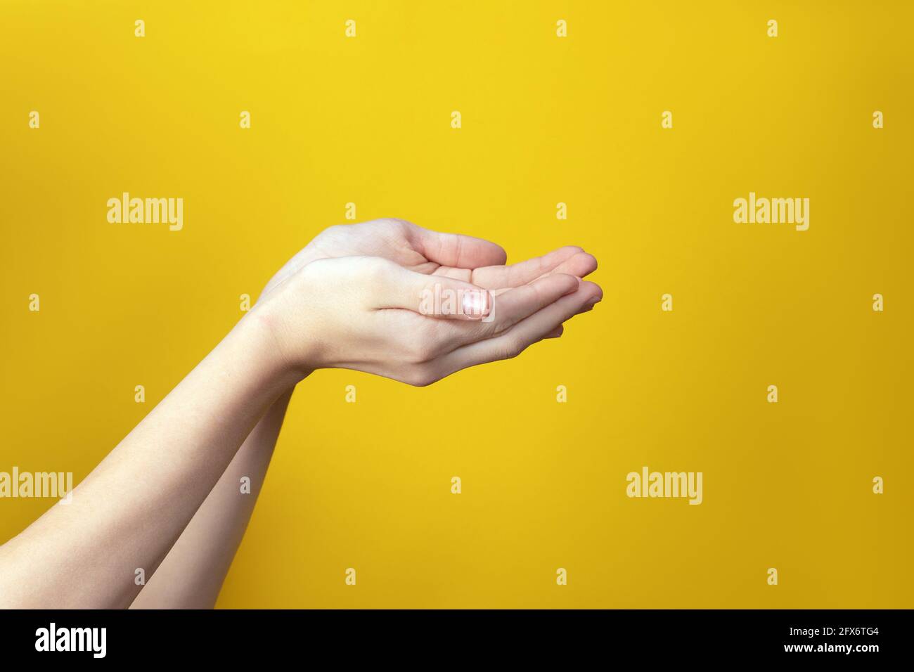Two hands raised up Stock Photo by ©Toberto 72621765