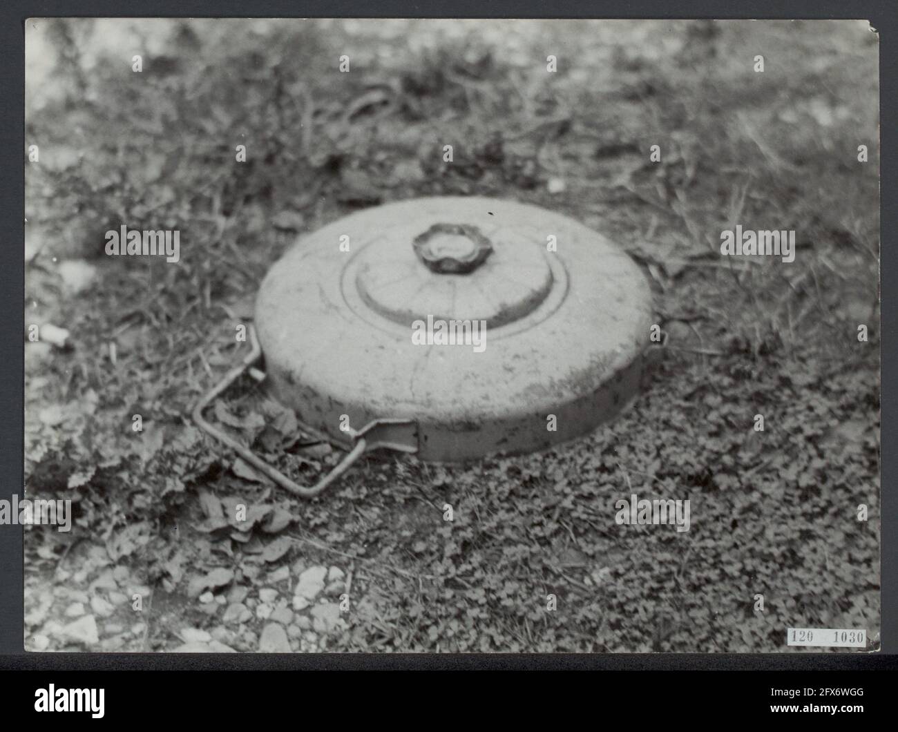 Clearing landmines near Hoek van Holland. A German landmine, August 1945, landmines, second world war, reconstruction, The Netherlands, 20th century press agency photo, news to remember, documentary, historic photography 1945-1990, visual stories, human history of the Twentieth Century, capturing moments in time Stock Photo