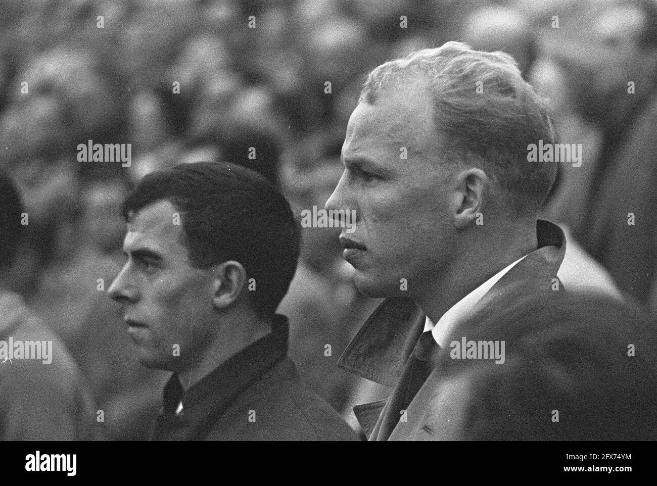 Coen Moulijn and Roel Wiersma during the playing of the national anthems, 21 October 1959, sports, soccer, The Netherlands, 20th century press agency photo, news to remember, documentary, historic photography 1945-1990, visual stories, human history of the Twentieth Century, capturing moments in time Stock Photo
