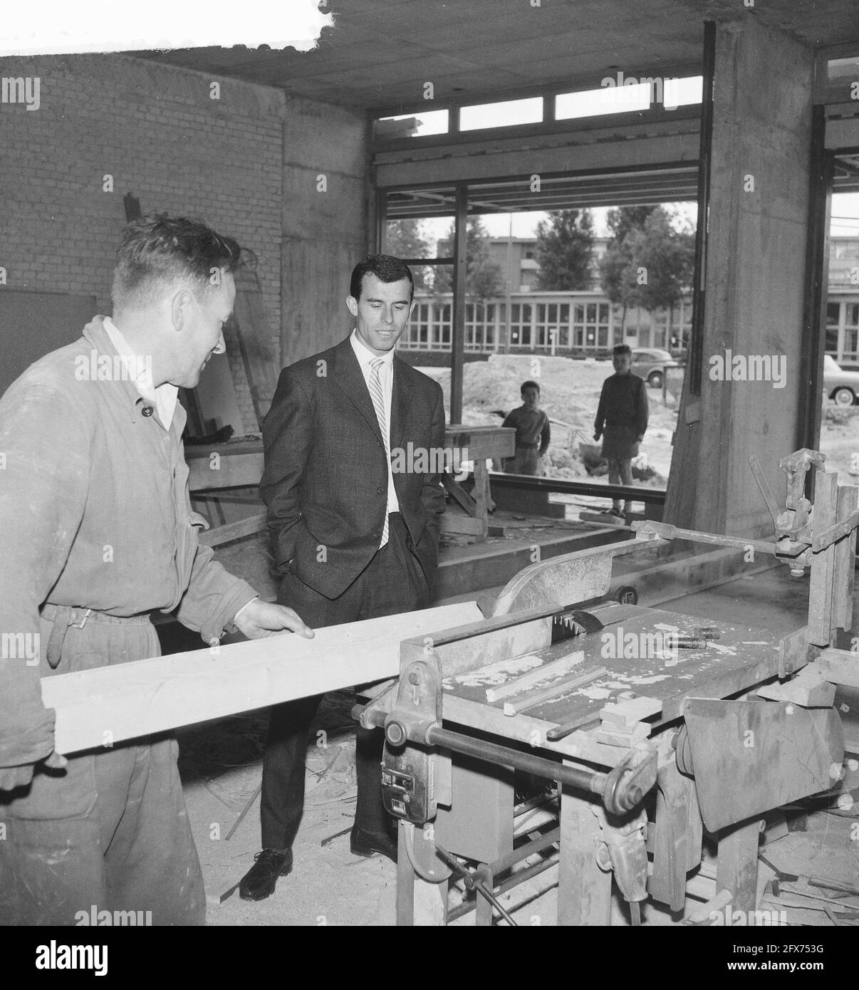 Coen Moulijn in his store under construction, June 1, 1961, construction, soccer players, stores, The Netherlands, 20th century press agency photo, news to remember, documentary, historic photography 1945-1990, visual stories, human history of the Twentieth Century, capturing moments in time Stock Photo